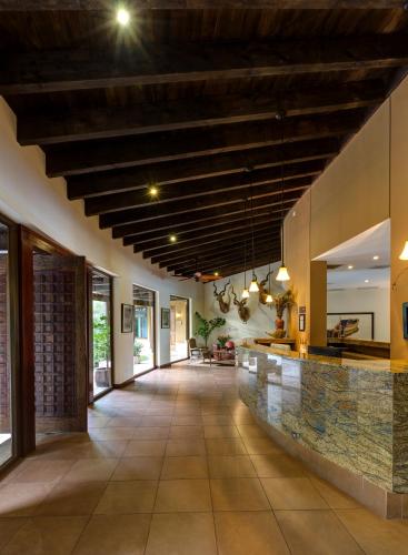 an open hallway with a stone counter in a house at Las Lagunas Boutique Hotel in Flores