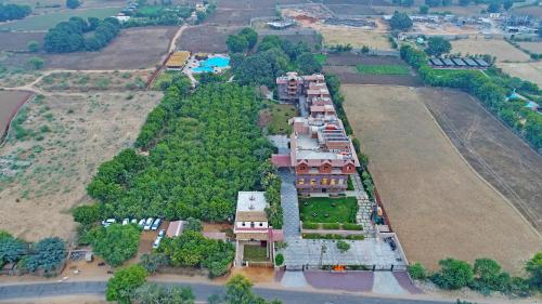 an aerial view of an old building on a field at The Baagh Ananta Elite Ranthambore in Sawāi Mādhopur