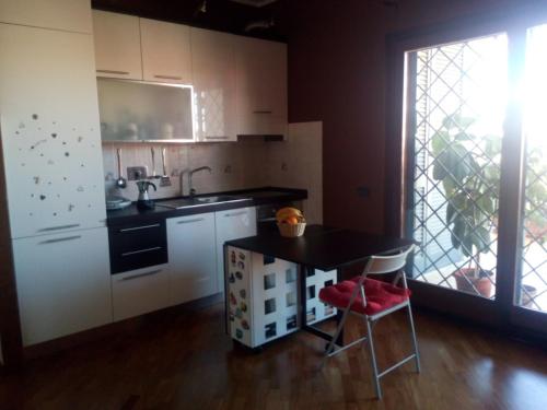 Kuchyň nebo kuchyňský kout v ubytování Mezzocammino Short Rent Apartment - CIU5125
