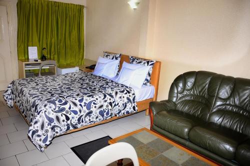 Кровать или кровати в номере Hôtel Saint Thomas