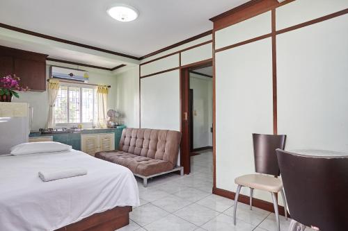 Postel nebo postele na pokoji v ubytování Amarin Inn