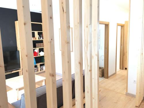 a room with wooden dividers in a house at Apartamento Vive Zaragoza in Zaragoza