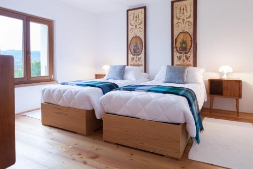 Ένα ή περισσότερα κρεβάτια σε δωμάτιο στο COLVAGO CIMA DODICI – DOLOMITES NATIONAL PARK