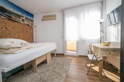 Llit o llits en una habitació de City Panorama