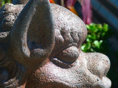 a statue of a woman with her eyes closed at BeachView Motel in Greymouth