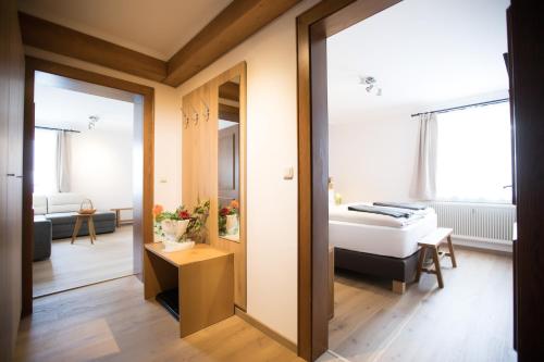 Postel nebo postele na pokoji v ubytování Hotel Moserwirt
