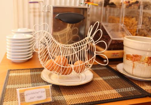 a wire strainer sitting on top of a table at Hotel Sonnenhof - bed & breakfast & appartements in Innsbruck