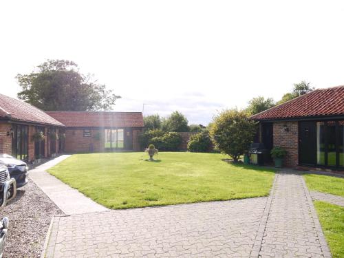 Κήπος έξω από το Barn Owl Lodge