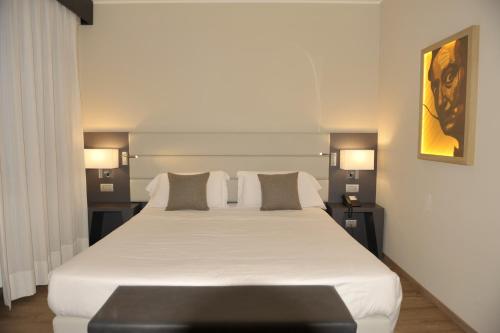 Letto o letti in una camera di Parco Hotel Sassi