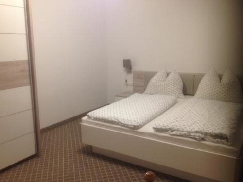 Ένα ή περισσότερα κρεβάτια σε δωμάτιο στο Haus Katharina
