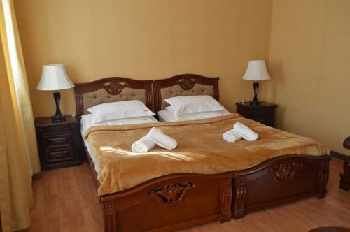 Ένα ή περισσότερα κρεβάτια σε δωμάτιο στο Eurika