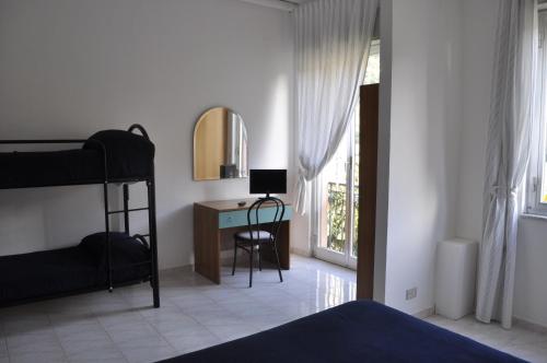 Кровать или кровати в номере Hotel Ristorante La Scogliera - NUOVA GESTIONE