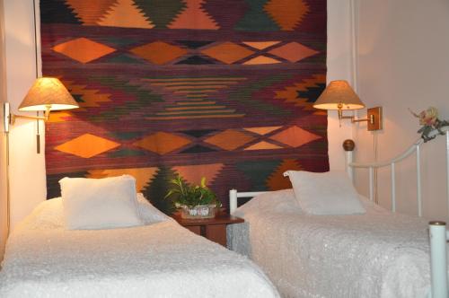 Ein Bett oder Betten in einem Zimmer der Unterkunft Finca Machangara