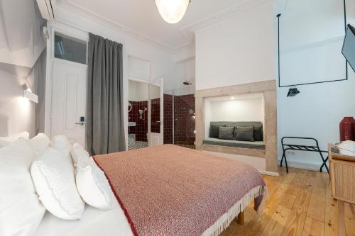 Katil atau katil-katil dalam bilik di Lisbon Cheese & Wine Suites