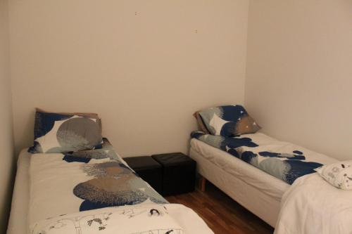 Postel nebo postele na pokoji v ubytování Arctic Jokasa Apartment