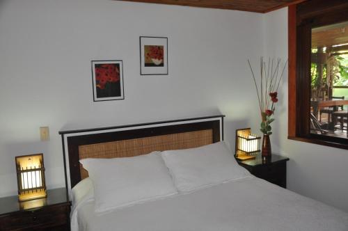 Ein Bett oder Betten in einem Zimmer der Unterkunft Finca Machangara