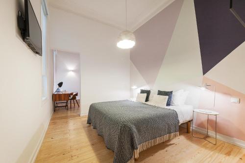 Katil atau katil-katil dalam bilik di Lisbon Cheese & Wine Suites