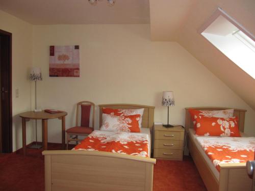 Ein Bett oder Betten in einem Zimmer der Unterkunft Pension Roez