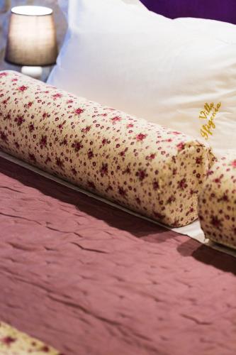 Postel nebo postele na pokoji v ubytování Villa Ifigenia
