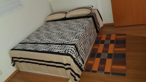 Llit o llits en una habitació de Apto Macae - 3 Quartos - 1001