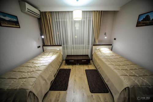 Cama o camas de una habitación en Garni Hotel 018 In
