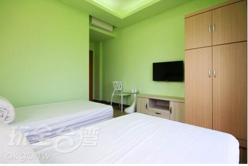 TV a/nebo společenská místnost v ubytování Tian Lin Green B&B