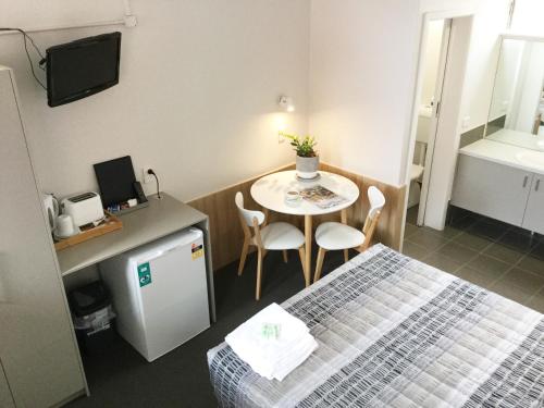 Postel nebo postele na pokoji v ubytování Northside Hotel Albury