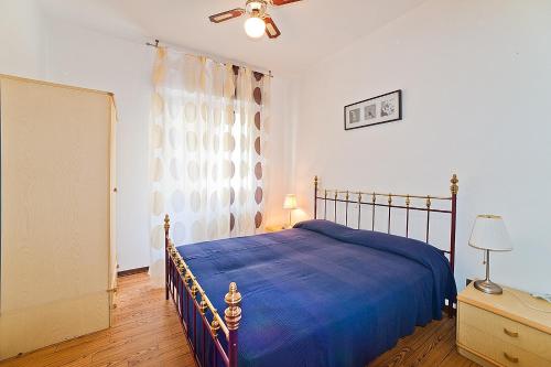 Un ou plusieurs lits dans un hébergement de l'établissement Ciao Caorle Appartamenti