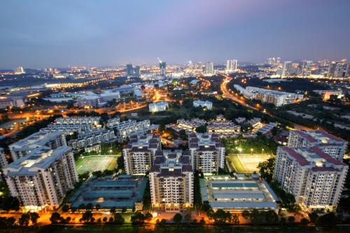 an aerial view of a city at night at Solstice Service Apartment CYBERJAYA WiFi Netflix KLIA in Cyberjaya