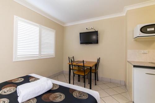 Postel nebo postele na pokoji v ubytování Villa Capri Motel