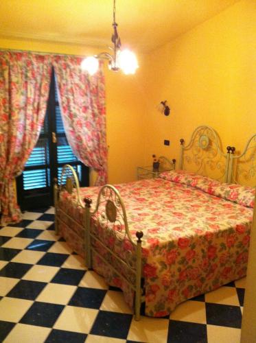 Cama o camas de una habitación en Le Lanterne