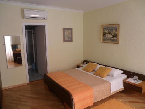 Postel nebo postele na pokoji v ubytování Rooms Alida