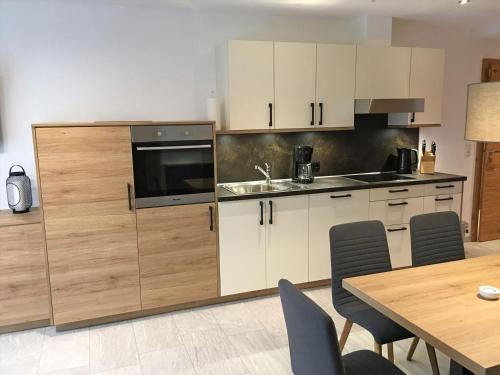 Kuchyň nebo kuchyňský kout v ubytování Haus Tirol
