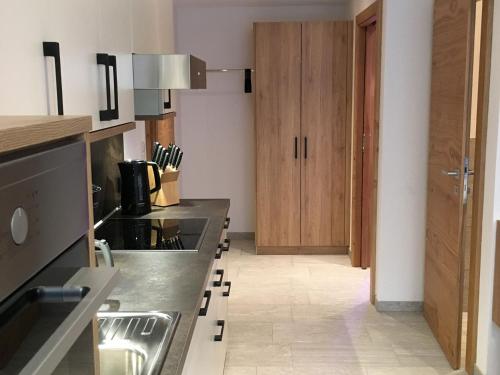 Kuchyň nebo kuchyňský kout v ubytování Haus Tirol