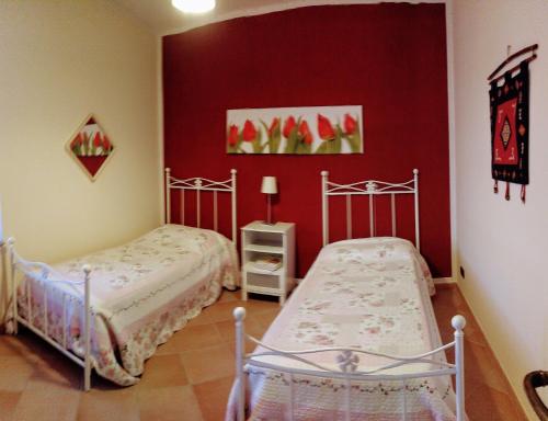 Postel nebo postele na pokoji v ubytování Cascina Bellezza