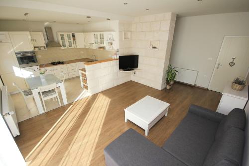 Kuchyň nebo kuchyňský kout v ubytování Apartmani Šulenta