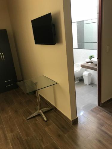 TV o dispositivi per l'intrattenimento presso Hotel Tito