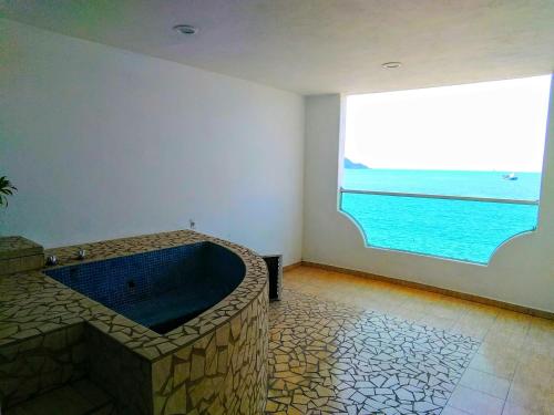 Χώρος καθιστικού στο Hotelito Escondido
