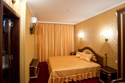 Katil atau katil-katil dalam bilik di Hotel Diamond