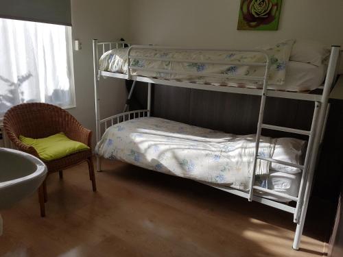 Postel nebo postele na pokoji v ubytování vakantiewoning zeumeruus