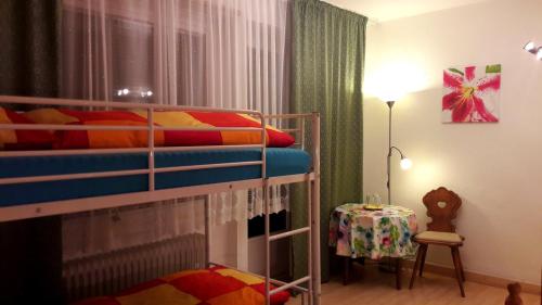 Ένα ή περισσότερα κρεβάτια σε δωμάτιο στο Hotel garni Am Hochwald