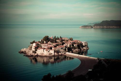 a small island in the middle of the water at Villa Edelweiss in Sveti Stefan