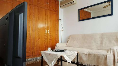 A bed or beds in a room at Casa de los amigos