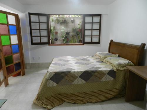 Katil atau katil-katil dalam bilik di Casa na Floresta