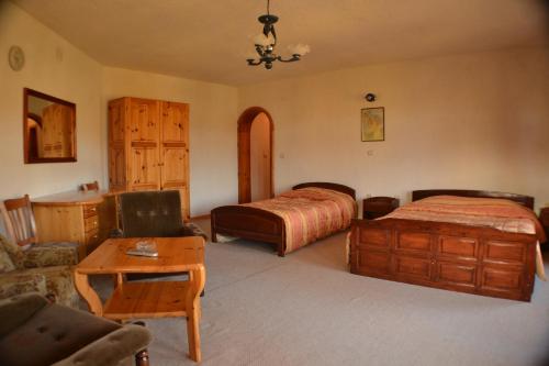 Postel nebo postele na pokoji v ubytování Family Hotel Silver