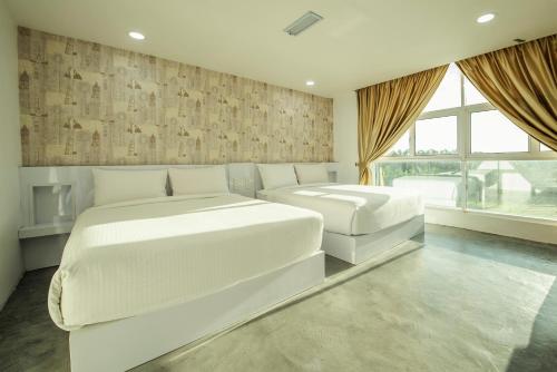 Katil atau katil-katil dalam bilik di Sinar Eco Resort