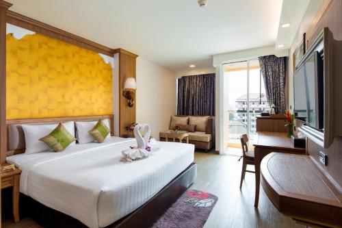 Letto o letti in una camera di Aiyara Palace