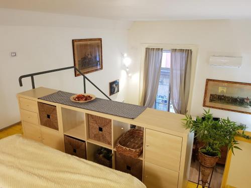 En eller flere senge i et værelse på Graziella 27