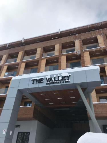 a building with a sign in front of it at The valley 309 in Nariani