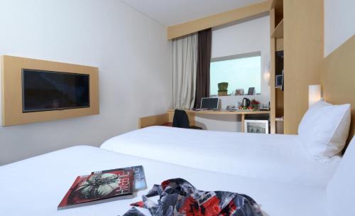 Postel nebo postele na pokoji v ubytování ibis Seef Manama